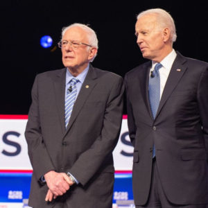Joe biden and Bernie Sanders standing