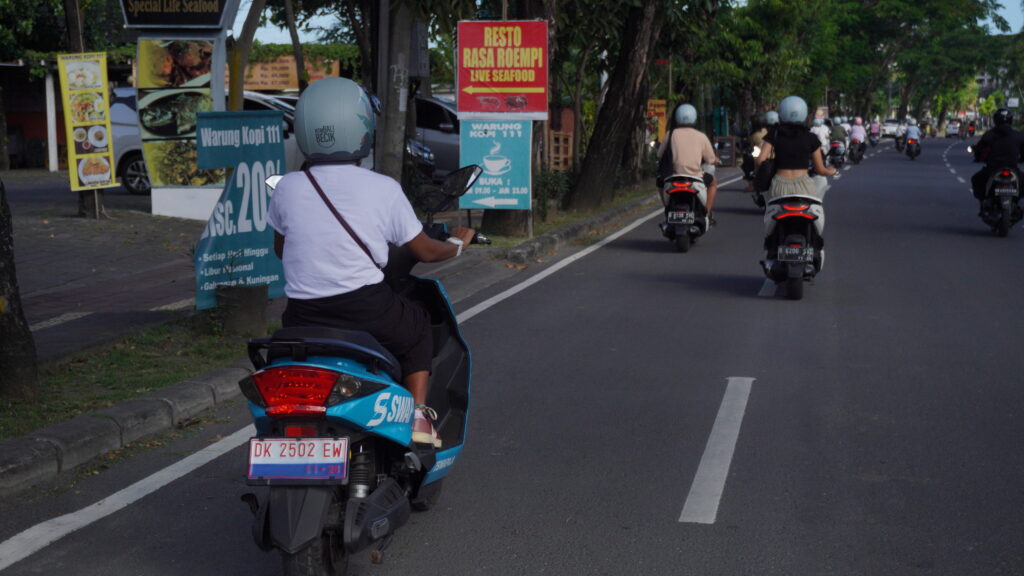 Tourists in Bali on two-wheelers